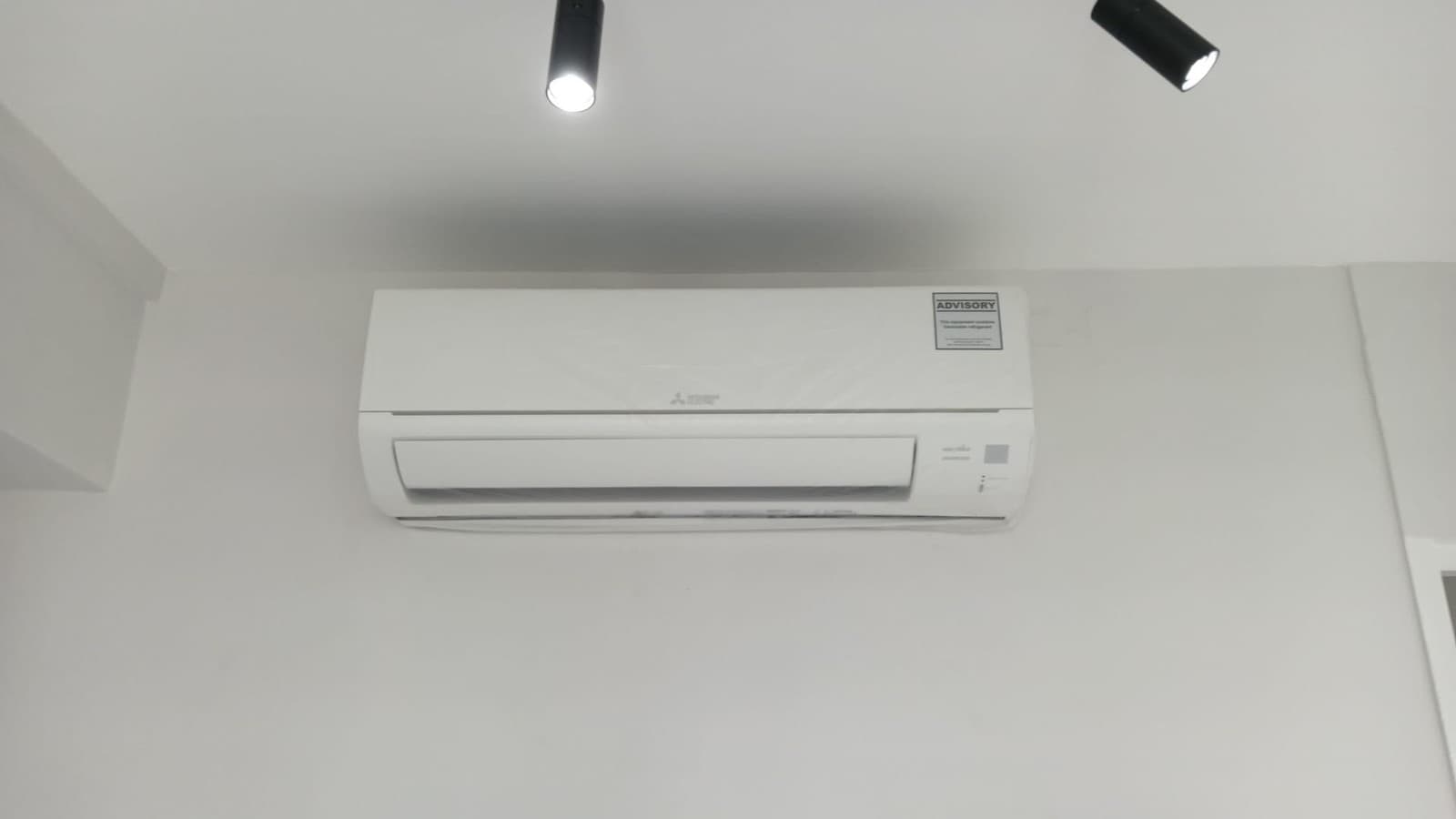 Wall-mounted aircon installed in a Singapore home